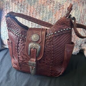 American West Shoulder Bag with Decorative Buckle and braided leather details